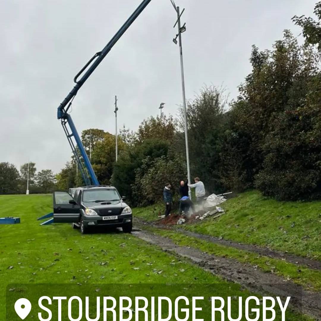 Cherry Picker Trailer with cherry picker fully extended fixing stadium lighting