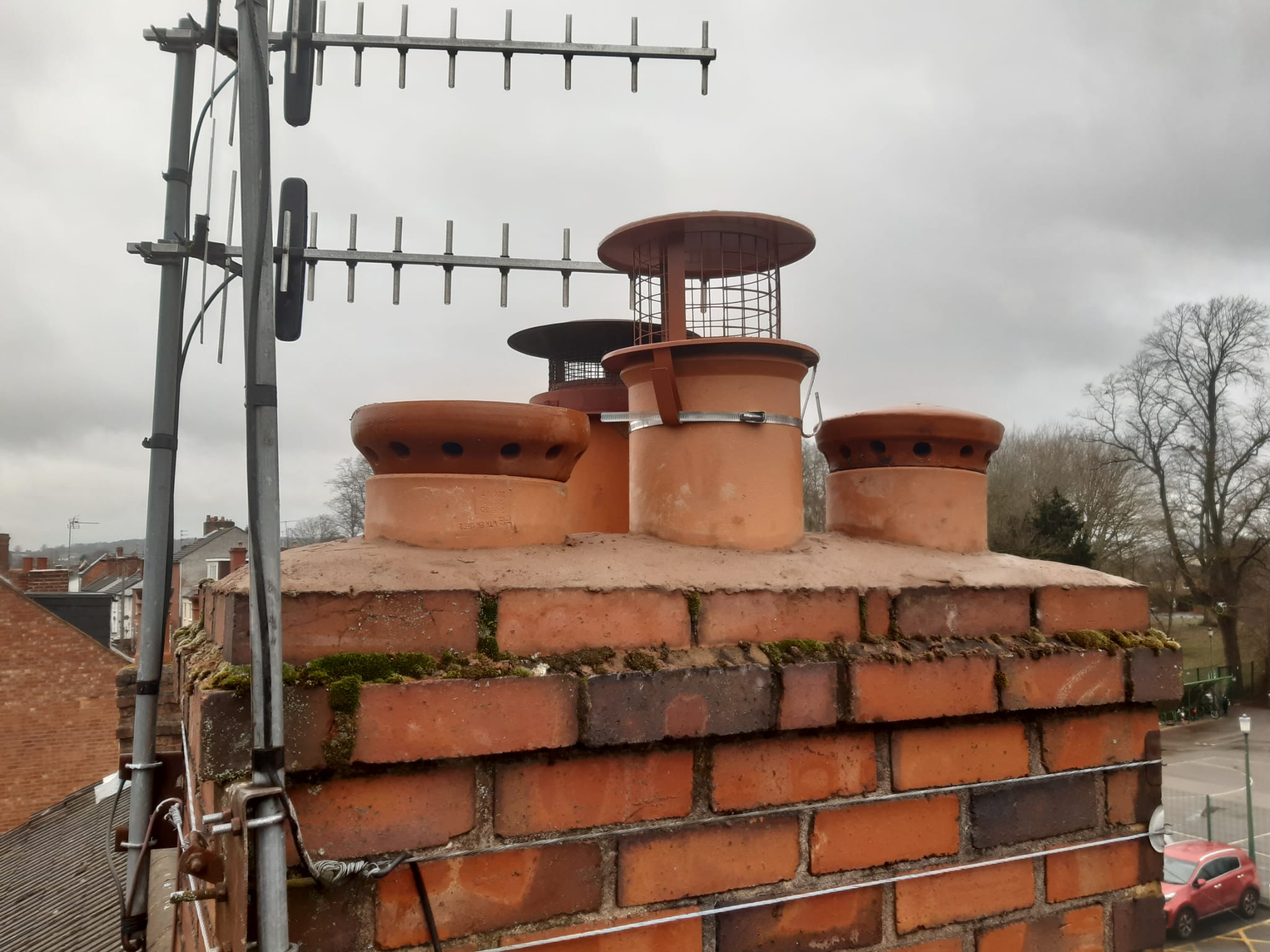 Photo of repaired brick chimney pots
